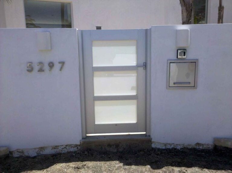 Callender's House Of Glass exterior glass door with entry window and building number 527