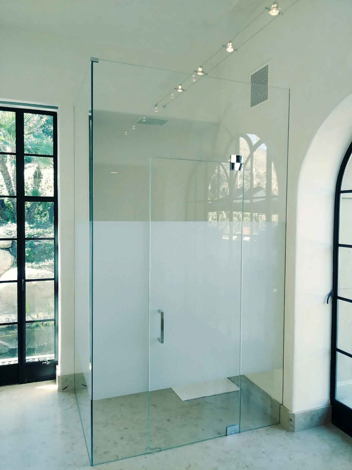 Callender's House Of Glass showroom interior with frameless glass panels and doors