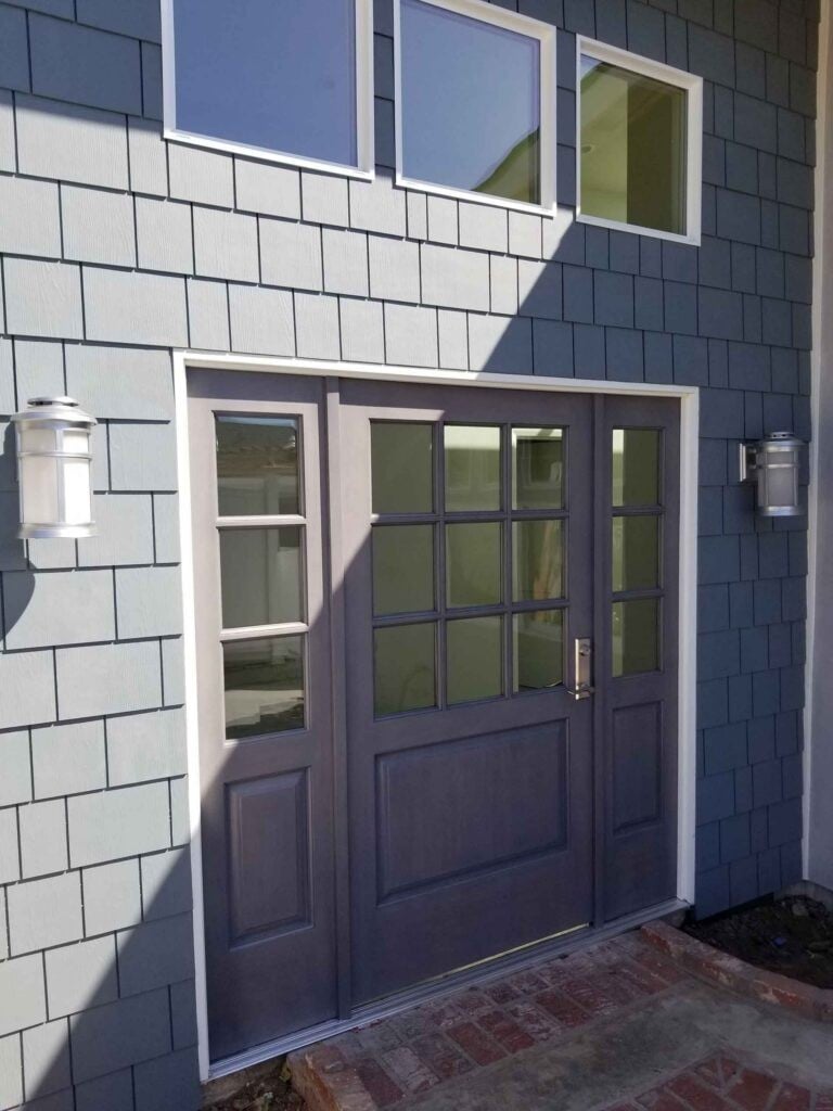 Callender's House Of Glass storefront glass door and windows on modern building exterior