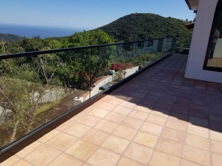 Callender's House Of Glass outdoor balcony glass railing with mountain view