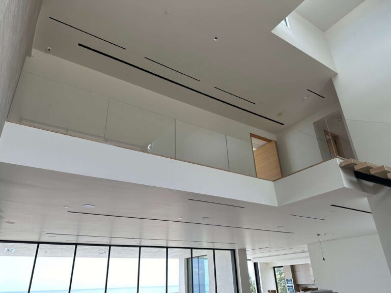 Callender's House Of Glass interior ceiling with sleek linear lighting
