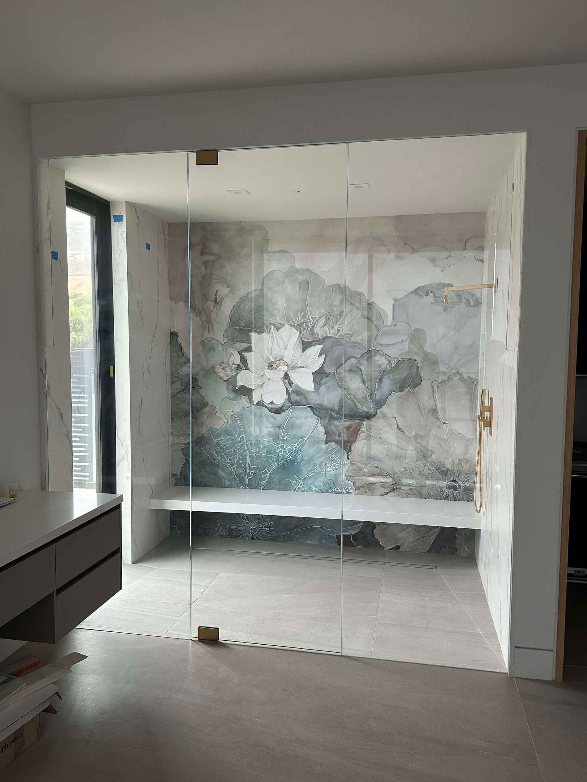 Bathroom glass shower enclosure with decorative floral etching by Callender's House Of Glass