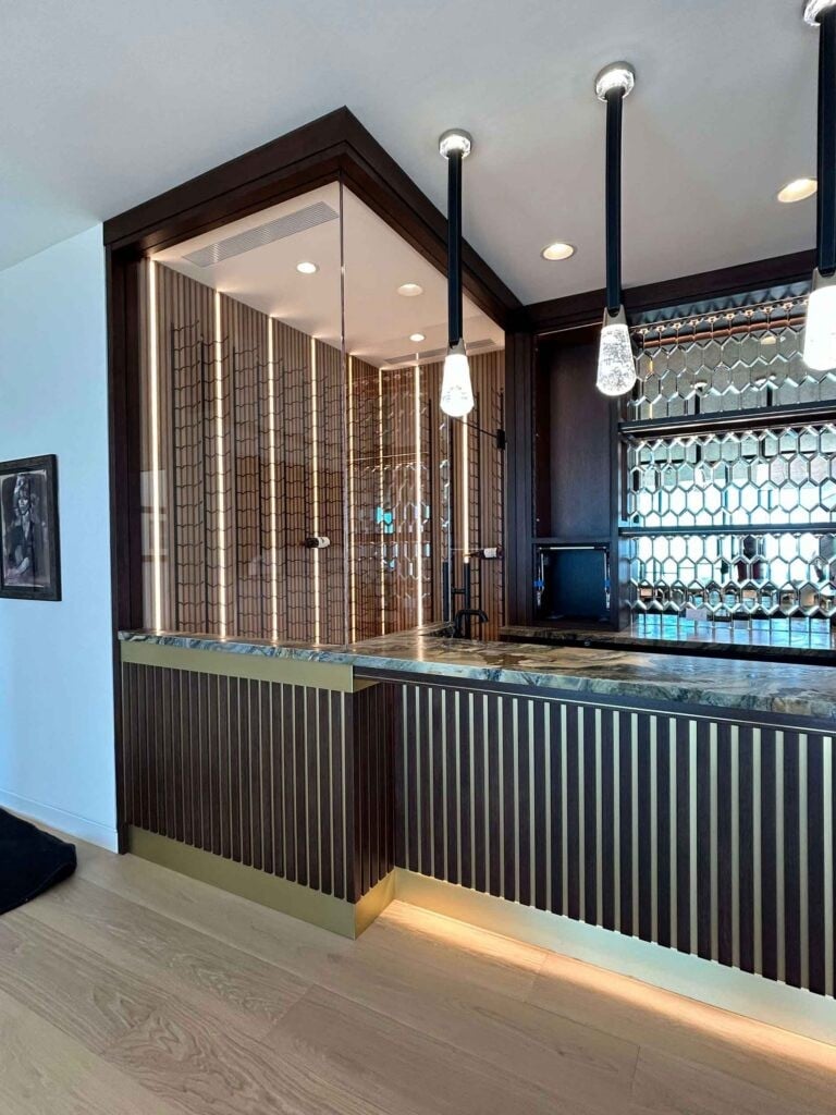 Callender's House Of Glass showroom display with glass partitions and bar lighting