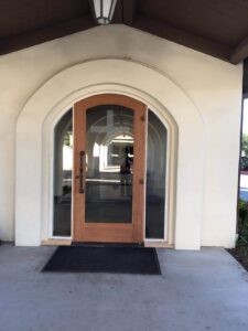 Callender's House Of Glass arched glass entrance door
