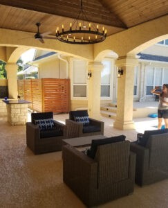 Protractor Roofing porch with outdoor patio seating and ceiling lights