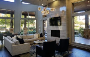 Protractor Roofing business office lobby interior with modern seating and fireplace
