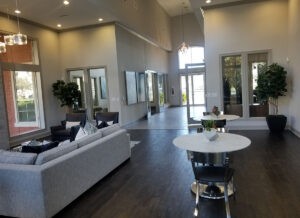 Modern interior of a Protractor Roofing business building with seating area and large windows