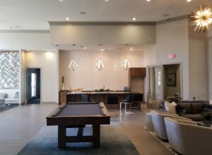 Protractor Roofing interior showroom with conference table and modern lighting