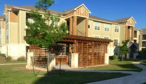 Protractor Roofing residential home exterior with roof and front patio