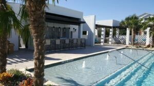 Protractor Roofing residential pool and outdoor patio with modern roof structure